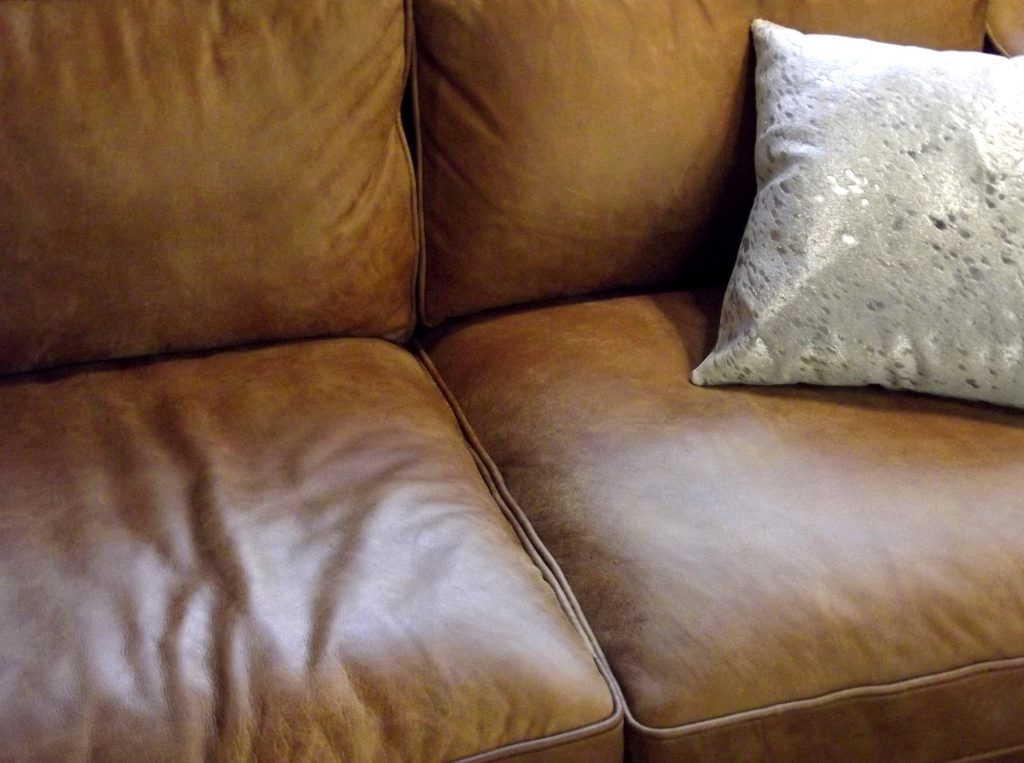 The Pros and Cons of Leather vs Fabric Furniture: Expert Advice